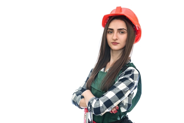 Young woman in coverall isolated on white