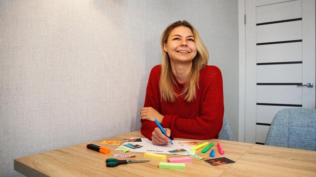 Photo young woman creating feng shui wish map visualization of dreams