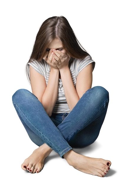 young woman crying on background