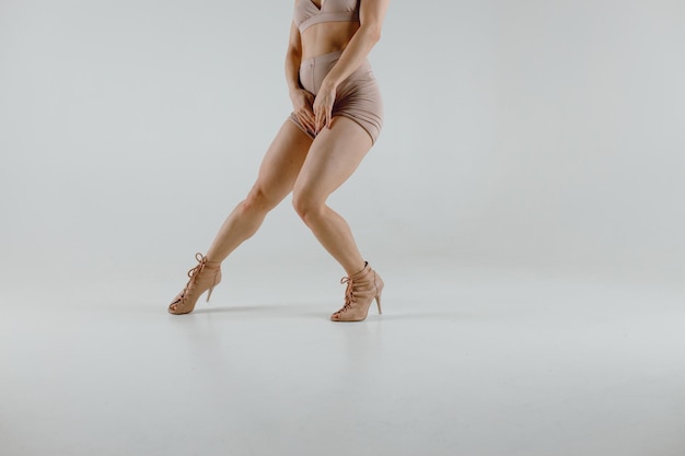 Young woman dancer dancing high heels dance