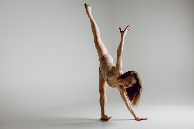 Young woman dancer dancing high heels dance