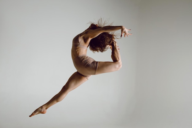 Young woman dancer dancing high heels dance