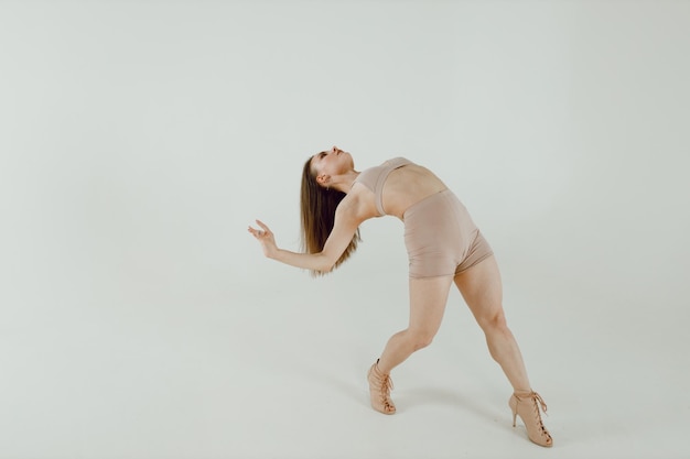 Young woman dancer dancing high heels dance