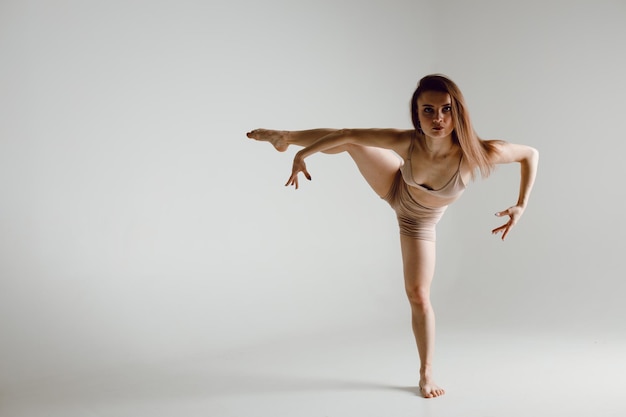 Young woman dancer dancing high heels dance