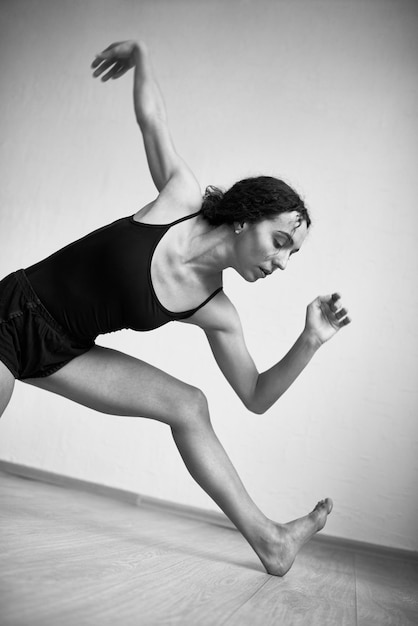 Young Woman Dancing Black and White