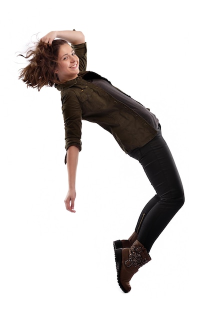 young woman dancing isolated on white background