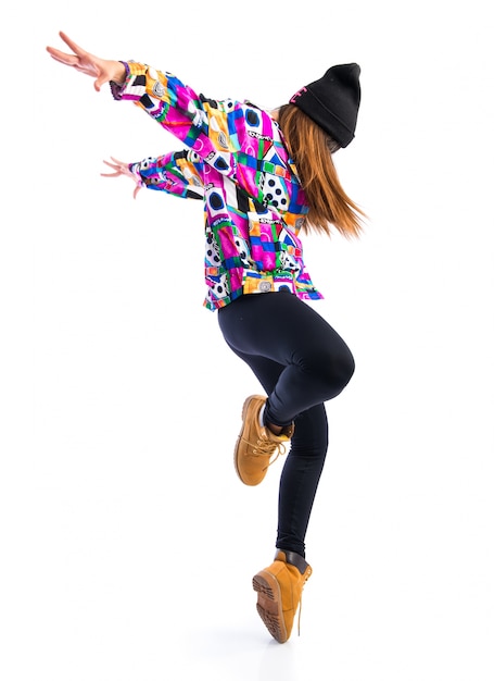 Photo young woman dancing street dance