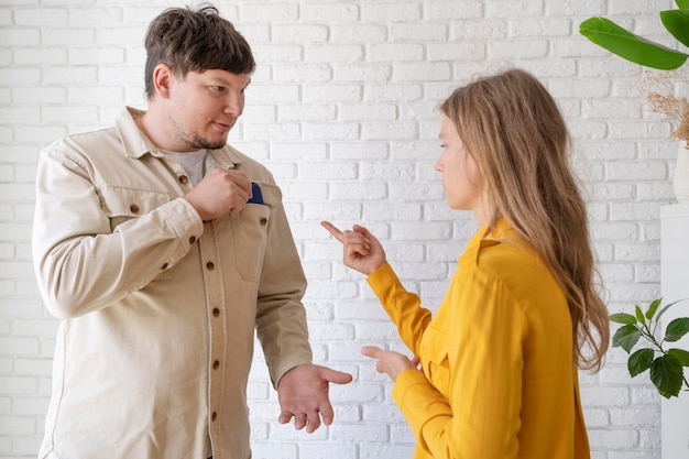 young woman and deaf man with audiology implant service or help for sound waves