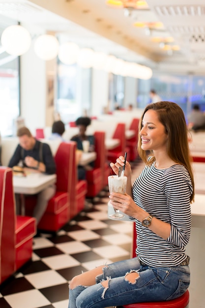 Young woman in diner