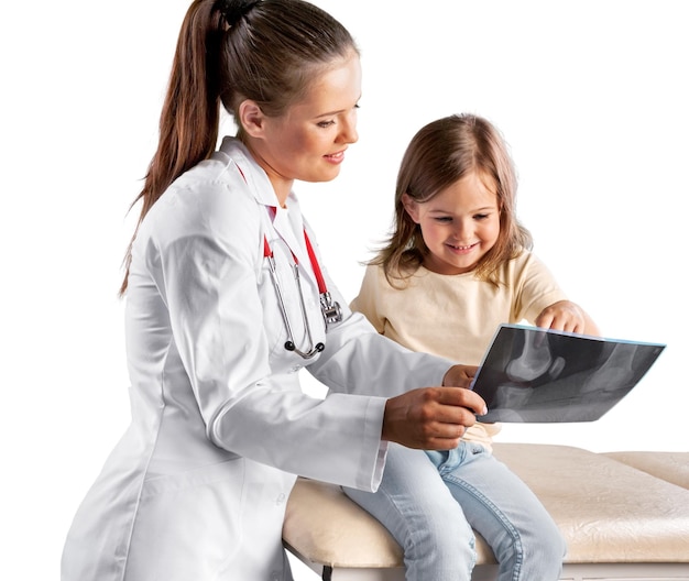 Young woman doctor with little girl