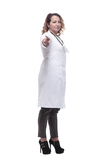 Young woman doctor with a stethoscope isolated on a white