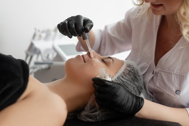 Young woman doing a cosmetic procedure