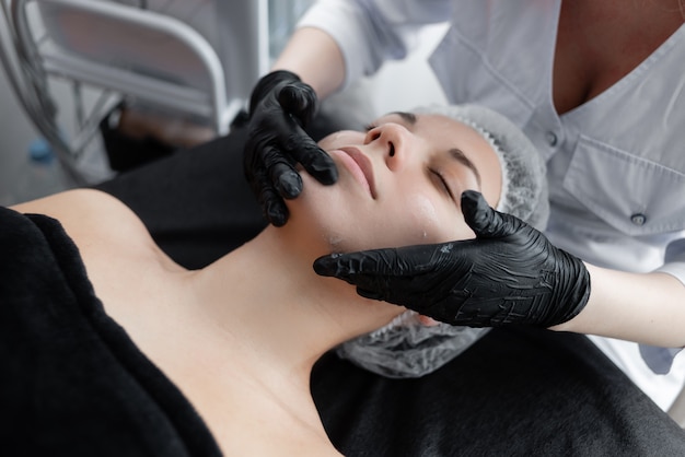 Young woman doing a cosmetic procedure