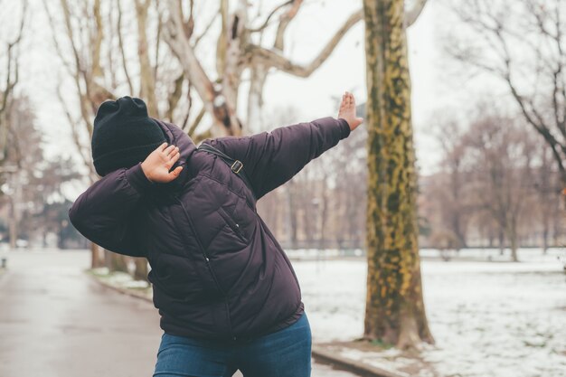 Young woman doing dab