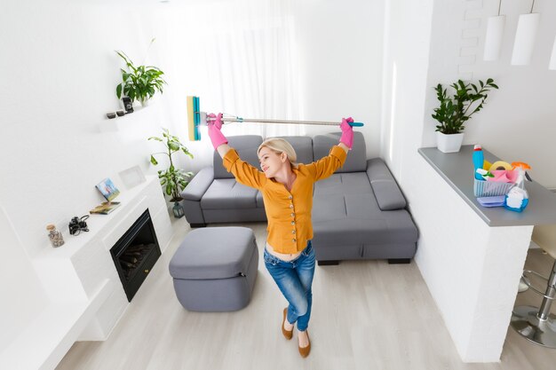 Young woman doing housework, cleaning