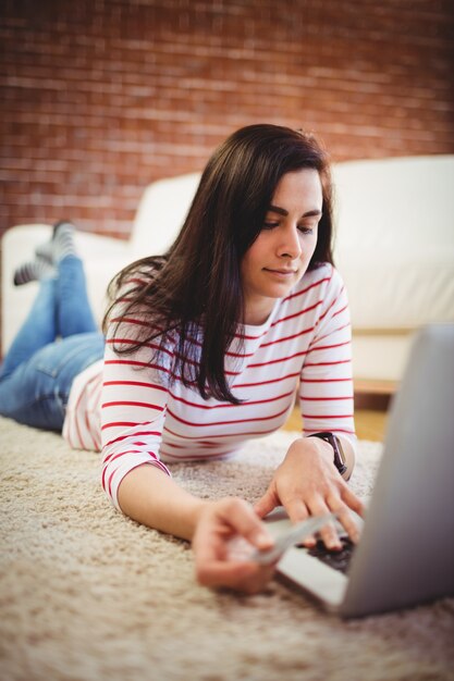 Young woman doing online shopping