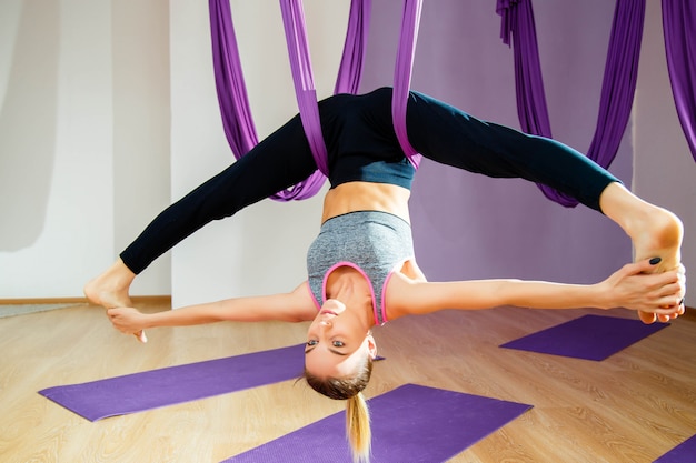 Young woman doing stretching and twine