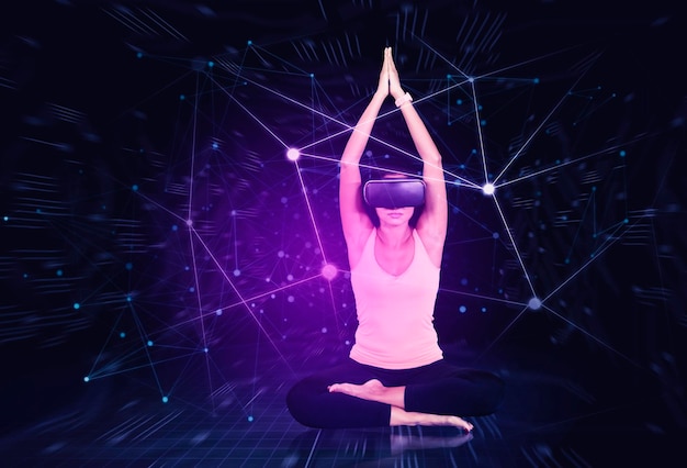 Young woman doing yoga exercise in the metaverse