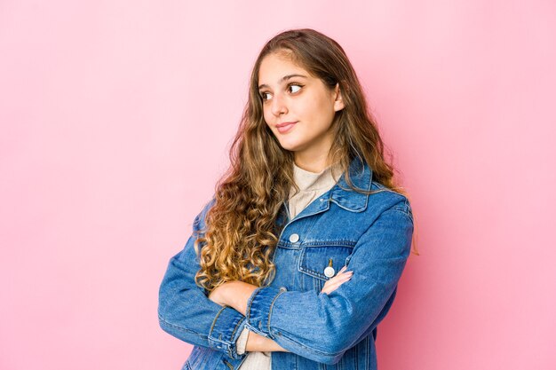 Young woman dreaming of achieving goals and purposes