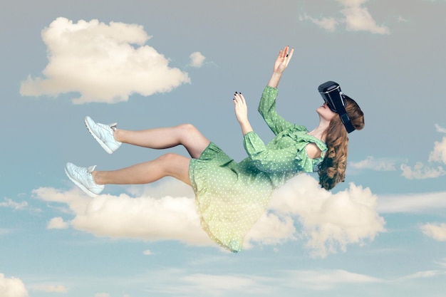 Photo young woman in dress flying with vr headset in the sky