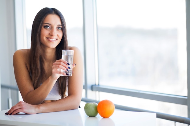 Young woman drinking water