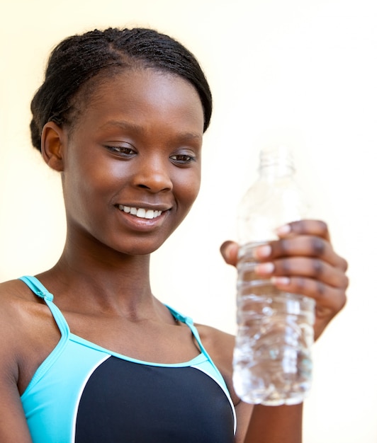 Young woman drinking water