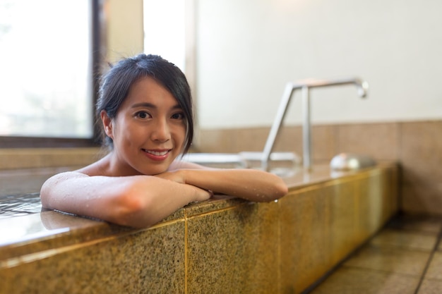 Young woman enjoy hot springs