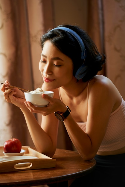 Young woman enjoying her meal