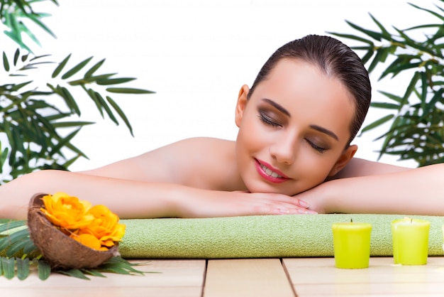 Young woman enjoying spa treatment