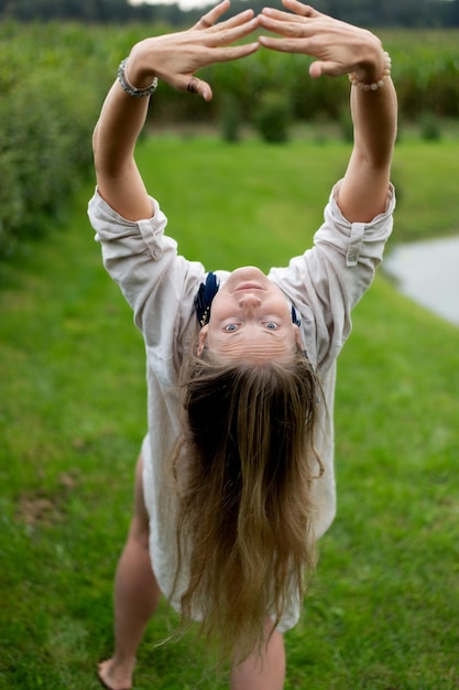 a young woman exercising at nature