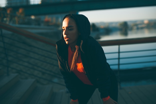 Young woman exercising outside