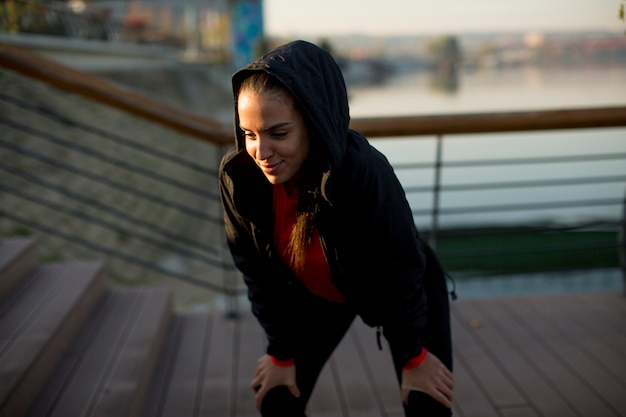 Young woman exercising outside