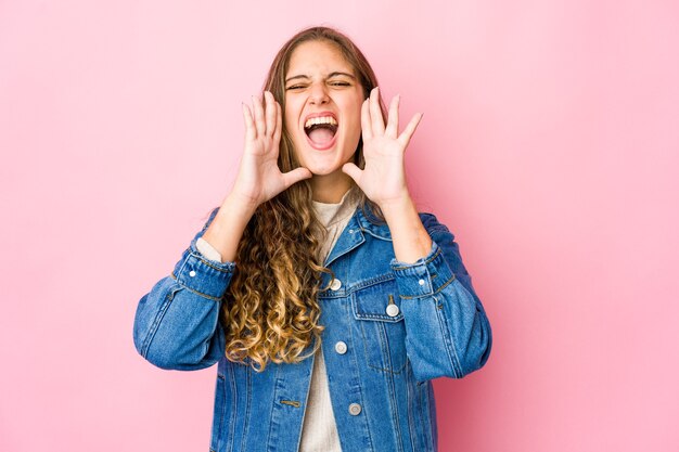 Young woman expressing emotions isolated