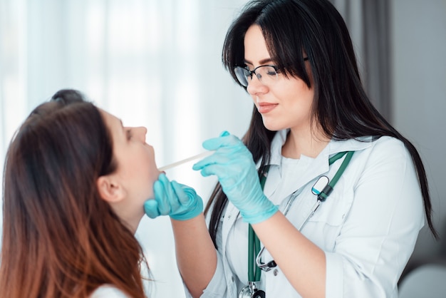 Young woman at family doctor reception