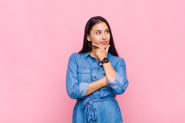 Young woman feeling thoughtful