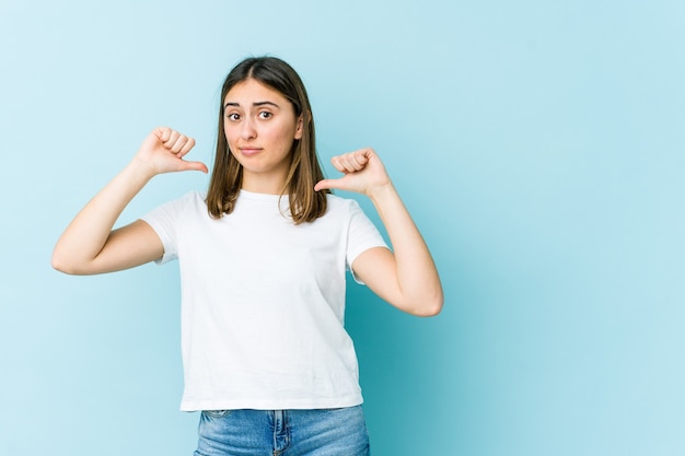 Young woman feels proud and self confident, example to follow