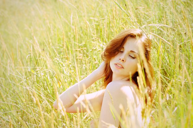 Young woman on field