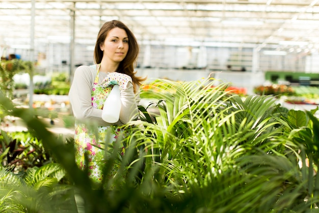 Young woman in flower garden