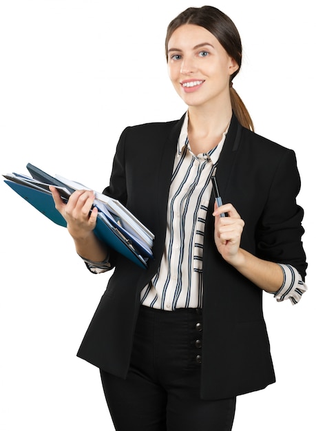 Young woman in formal outfit holding a stack of documents isolated on white 