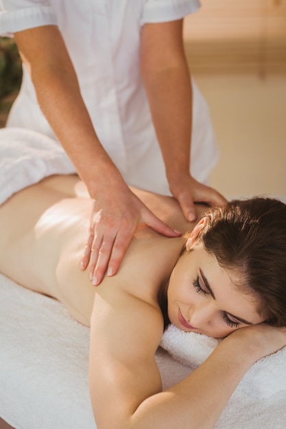 Young woman getting back massage