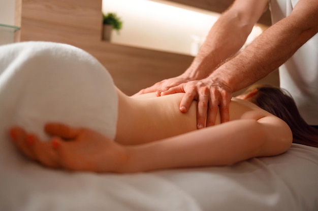 Young woman getting a back massage