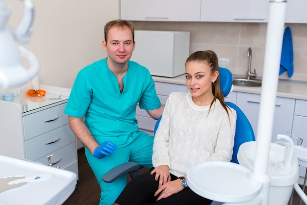 Young woman getting dental treatment teeth in the dentist