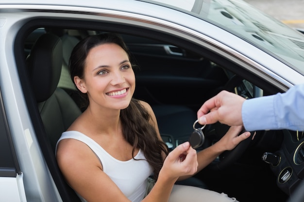 Young woman getting her key