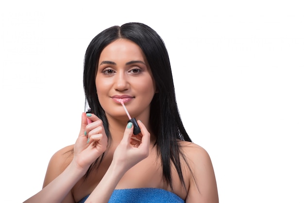 Young woman getting make-up isolated