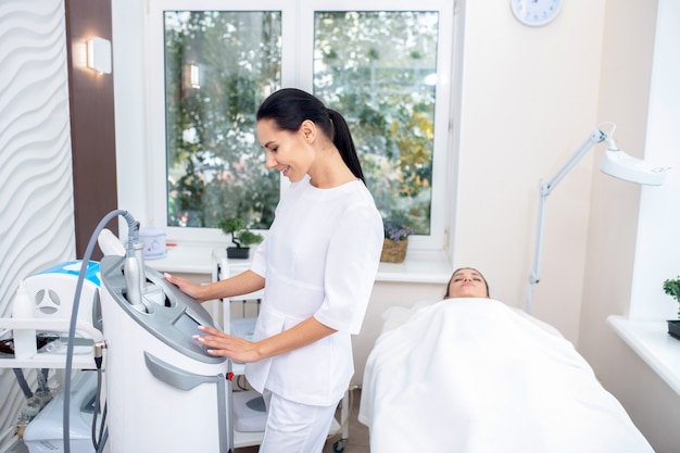 young woman getting an ultrasound massage therapy