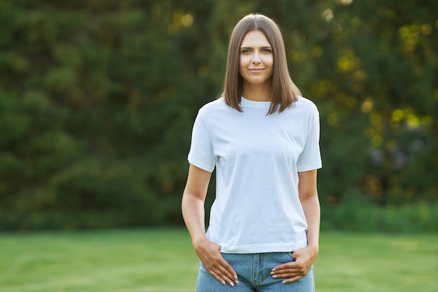 Young woman in gray shirt. High quality photo