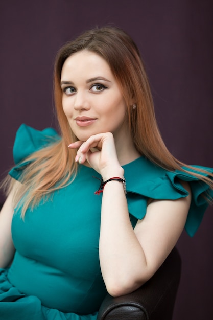 Young woman in a green dress