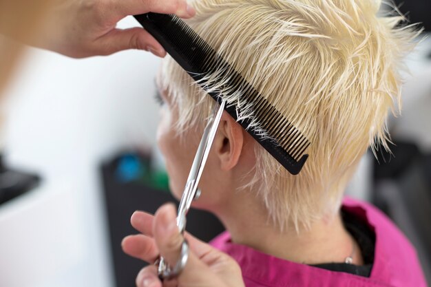 Young woman at hairdresser