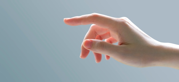 Young woman hand touching someting