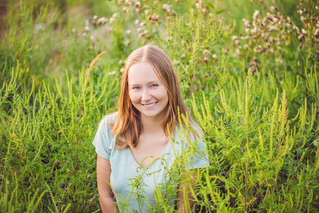 Young woman happy because no longer feels allergic to ragweed